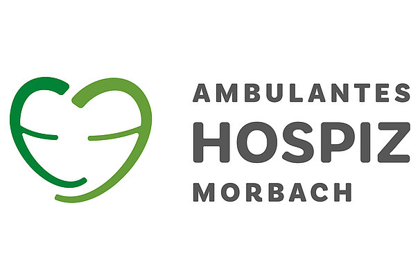 Logo des Ambulanten Hospiz Morbach mit stilisiertem grünem Herz und Schriftzug