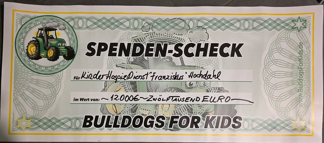 Spenden-Scheck i. W. v. 12.000 €